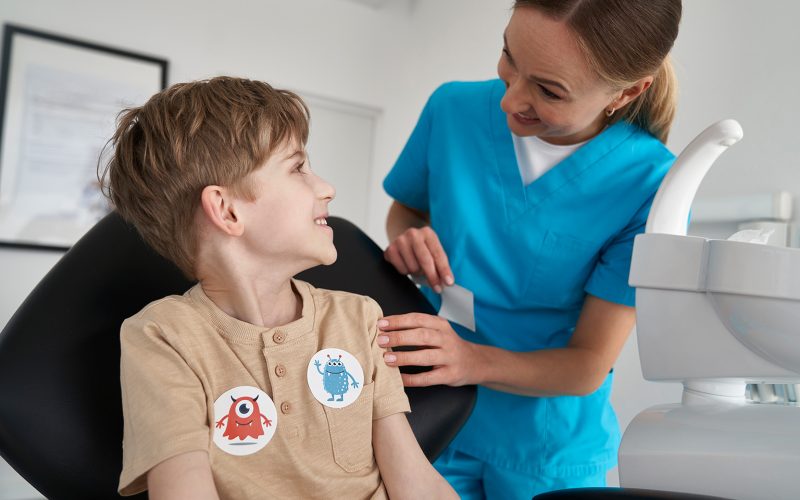 little-boy-having-stickers-after-the-dentist-s-app-2024-11-28-10-57-38-utc