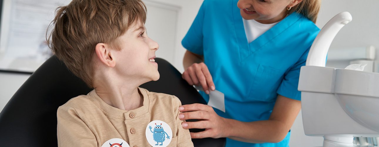 little-boy-having-stickers-after-the-dentist-s-app-2024-11-28-10-57-38-utc